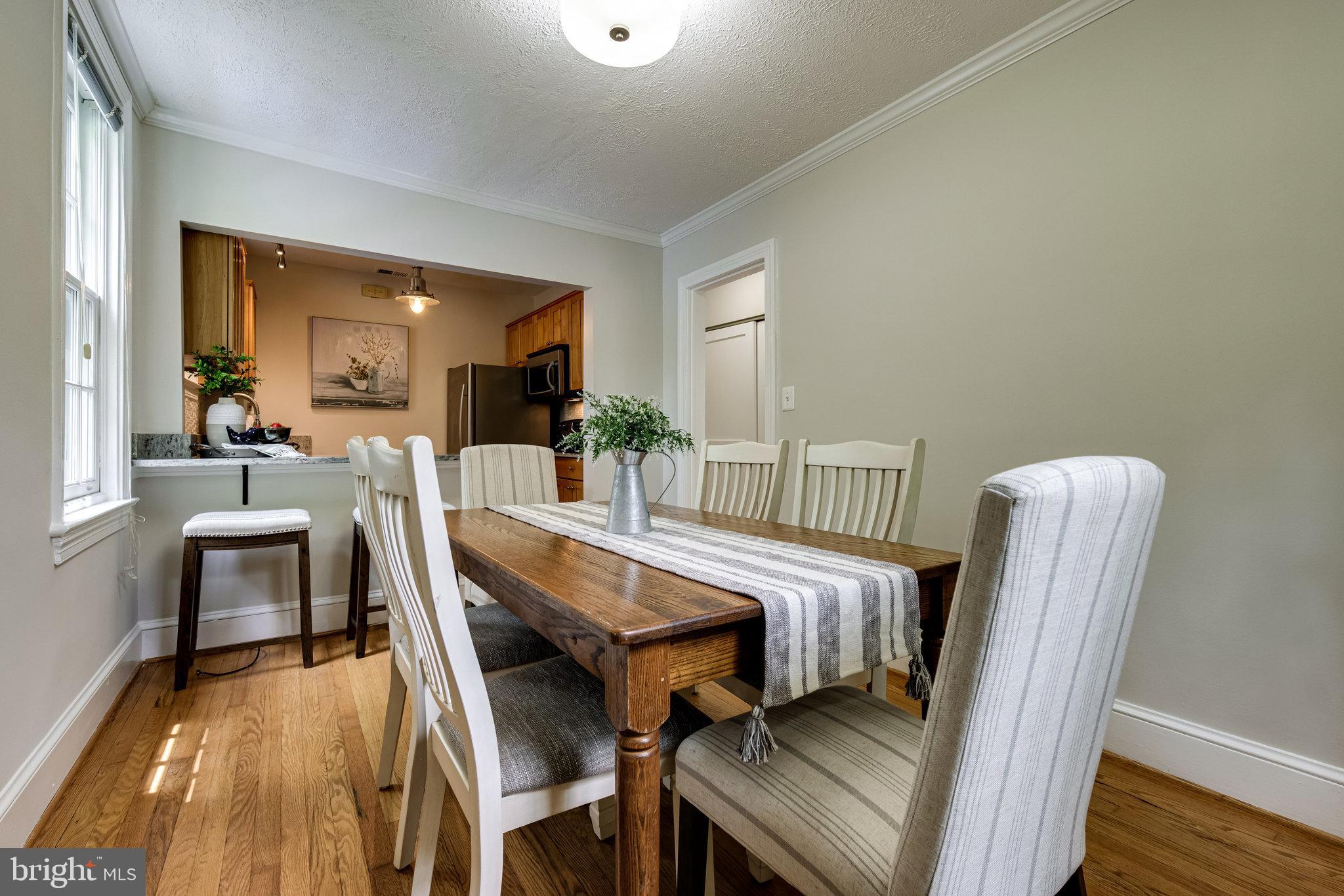 2707 Russell Road Alexandria, VA 22305 - Photo 20 of 69 Open space between kitchen and dining