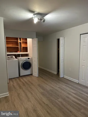 a view of a balcony with wooden floor