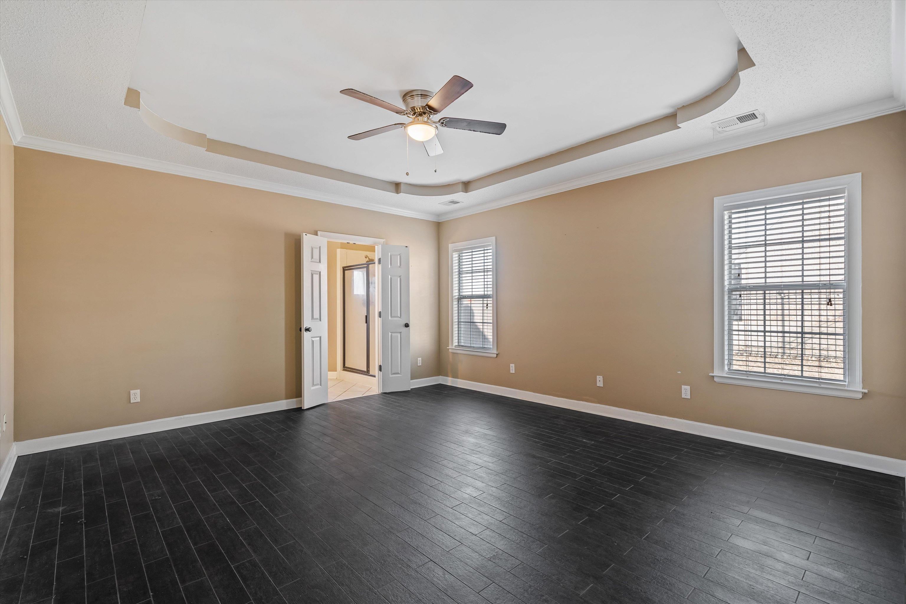 4972 Pleasant Ridge Drive Olive Branch, MS 38654 - Photo 16 of 24 a view of an empty room with wooden floor and a window