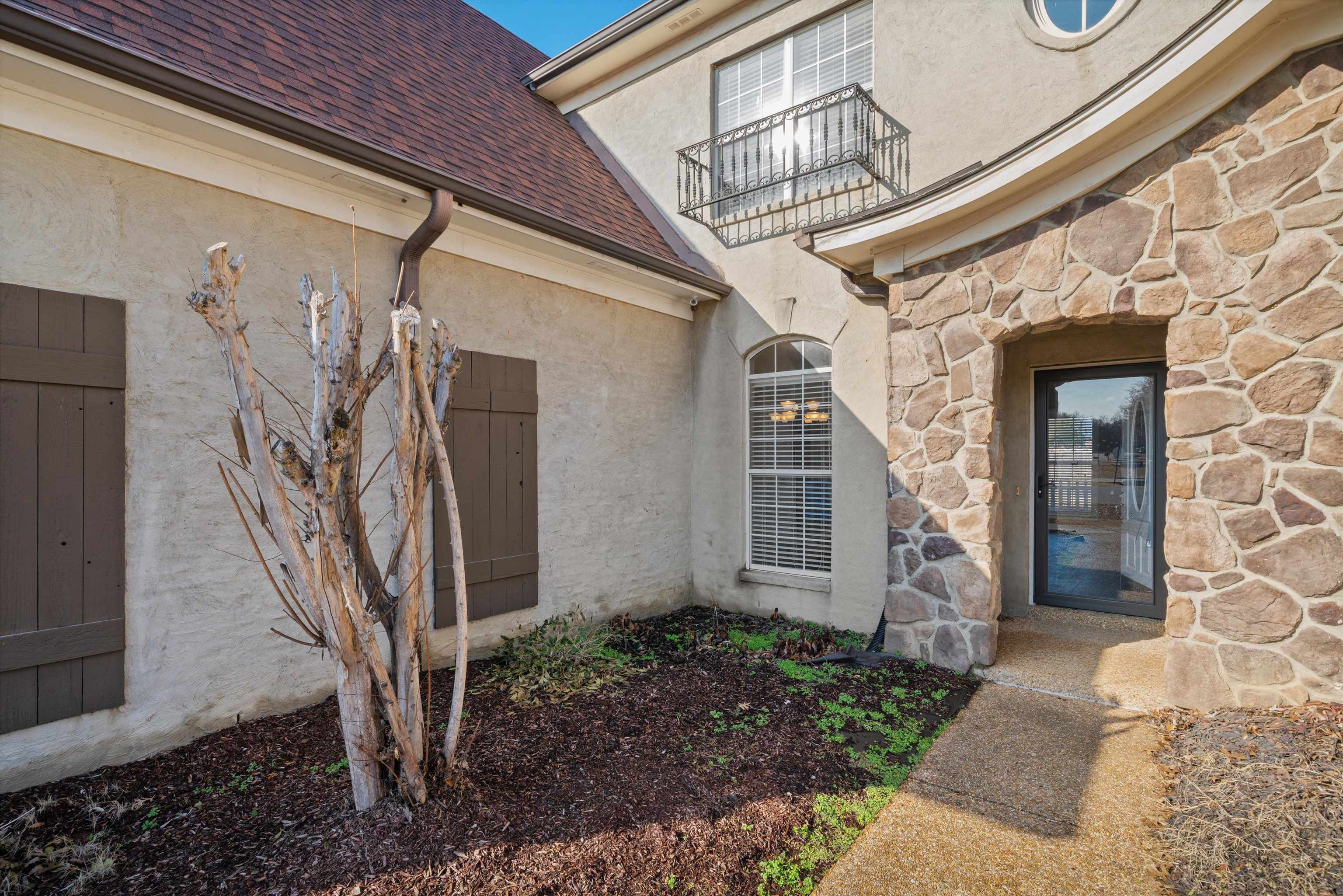 4972 Pleasant Ridge Drive Olive Branch, MS 38654 - Photo 4 of 24 a view of a house with a small porch