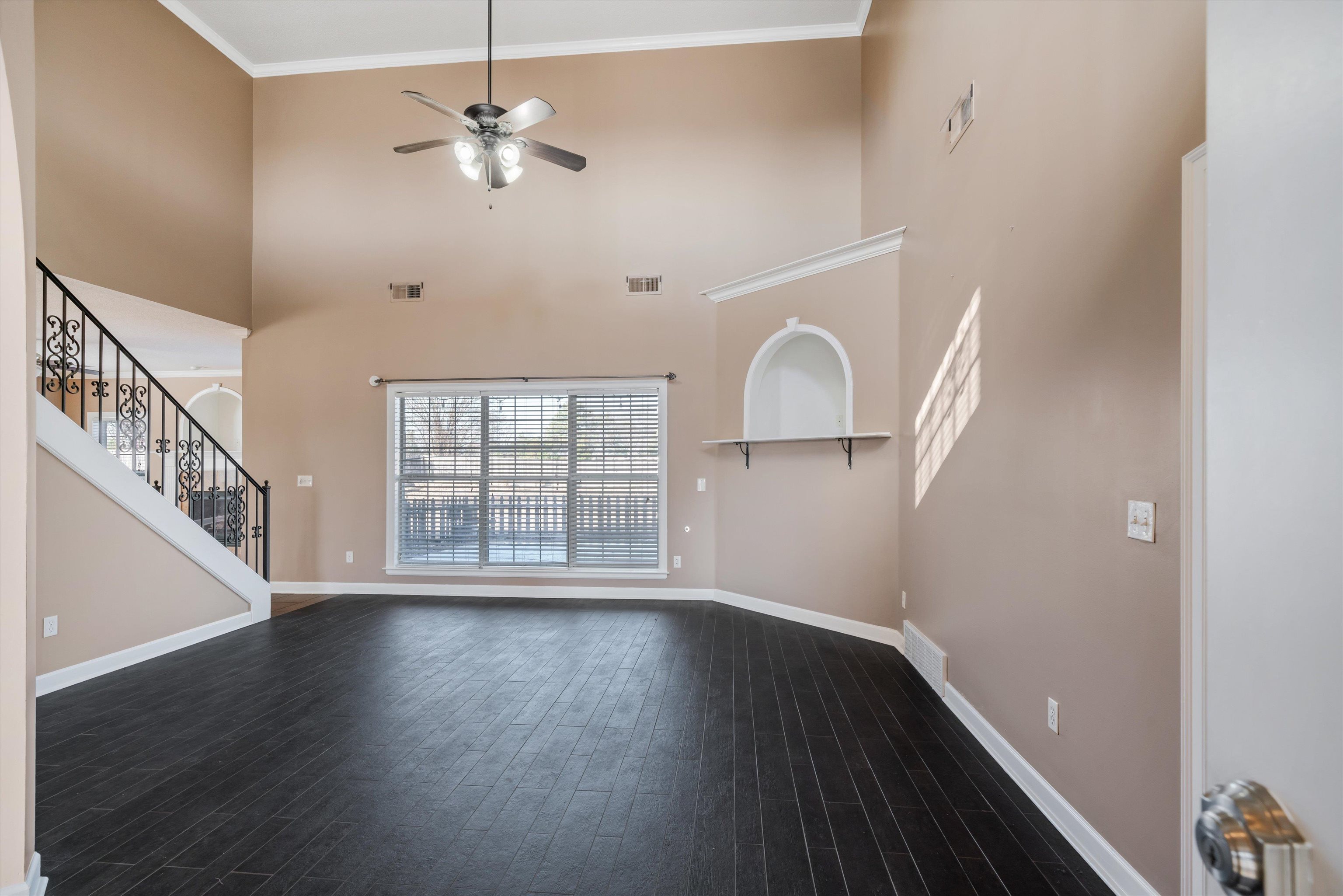 4972 Pleasant Ridge Drive Olive Branch, MS 38654 - Photo 6 of 24 wooden floor in an empty room with a window