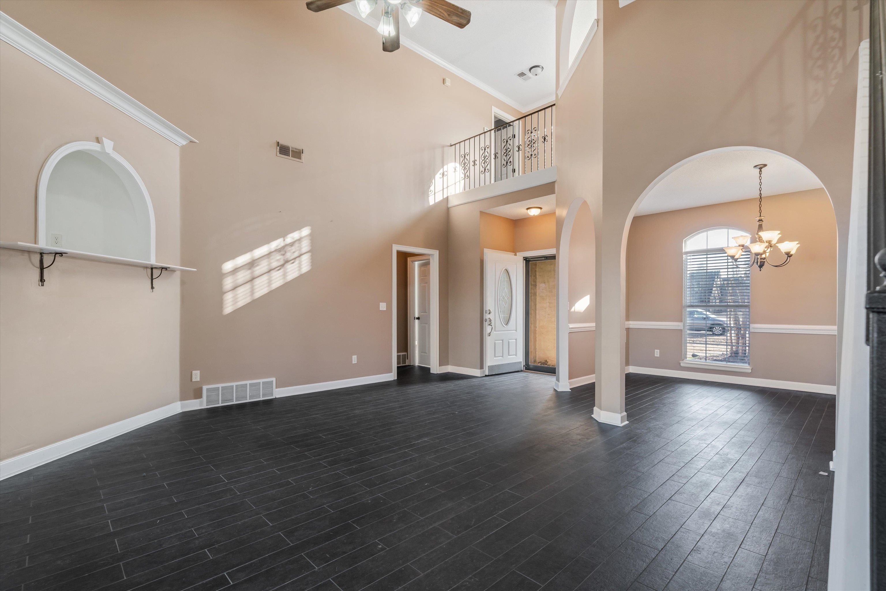 4972 Pleasant Ridge Drive Olive Branch, MS 38654 - Photo 7 of 24 wooden floor in an empty room with a window