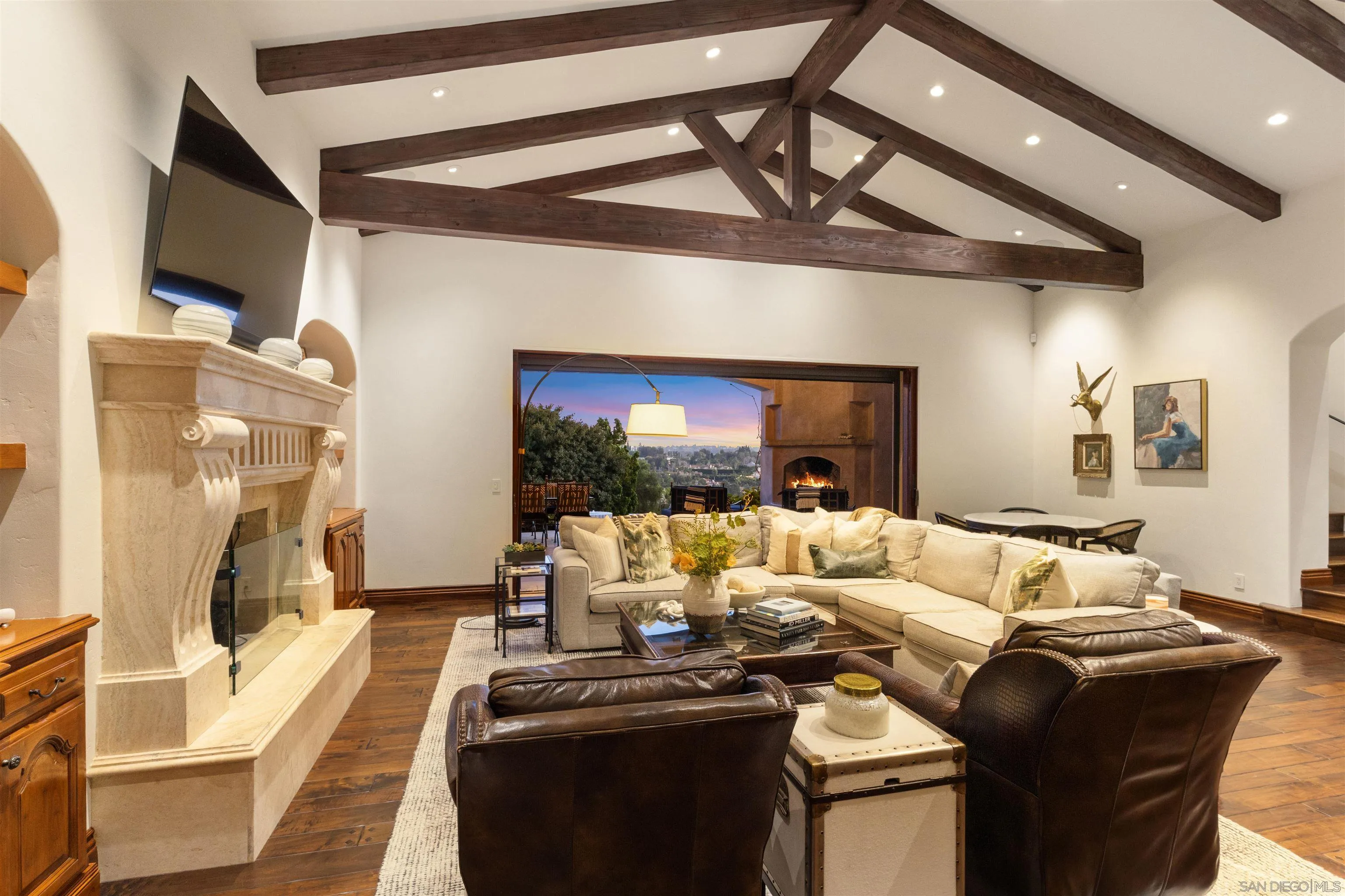 6871 Las Colinas Rancho Santa Fe, CA 92067 - Photo 16 of 60 a living room with furniture and a fireplace