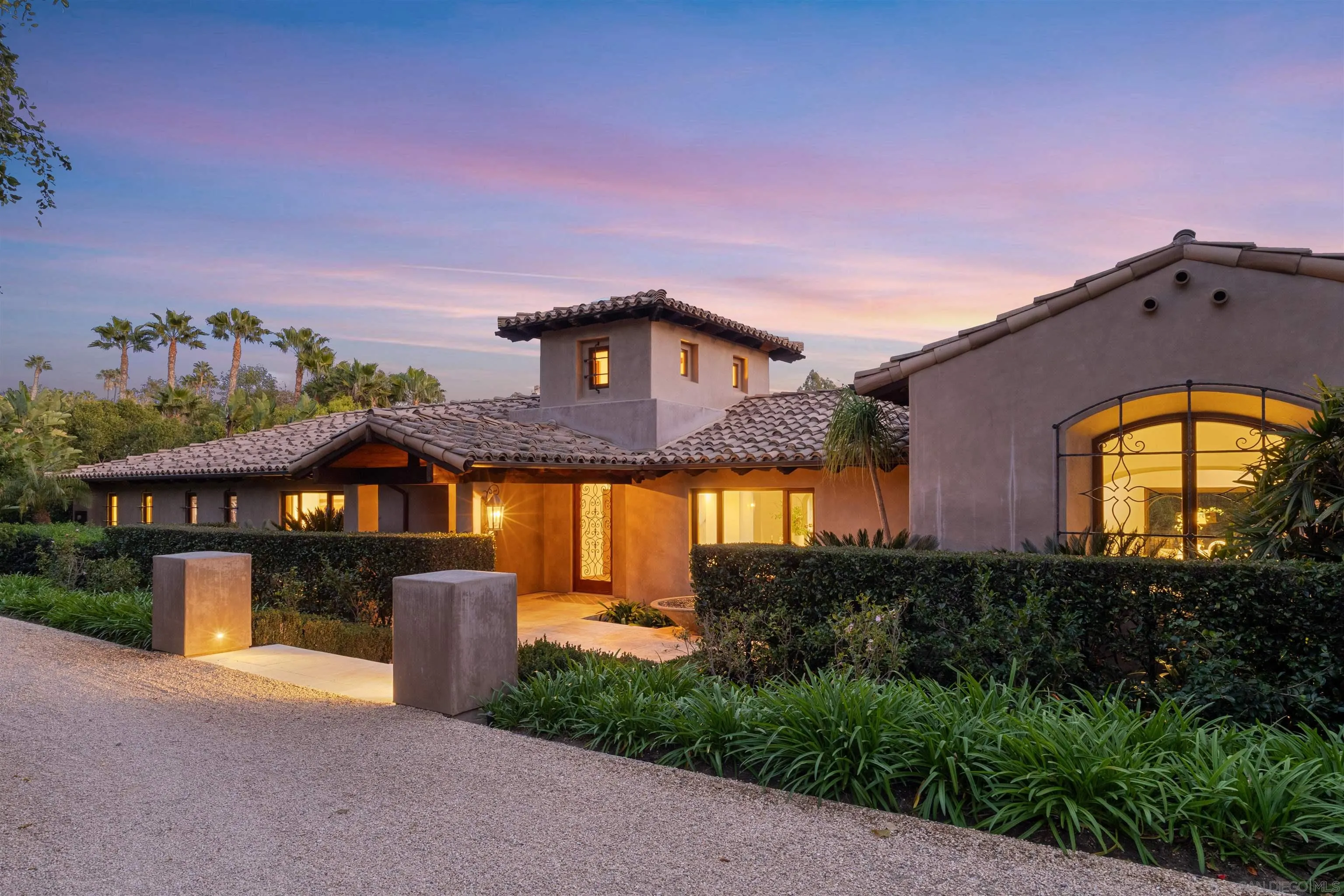 6871 Las Colinas Rancho Santa Fe, CA 92067 - Photo 2 of 60 a front view of a house with a yard