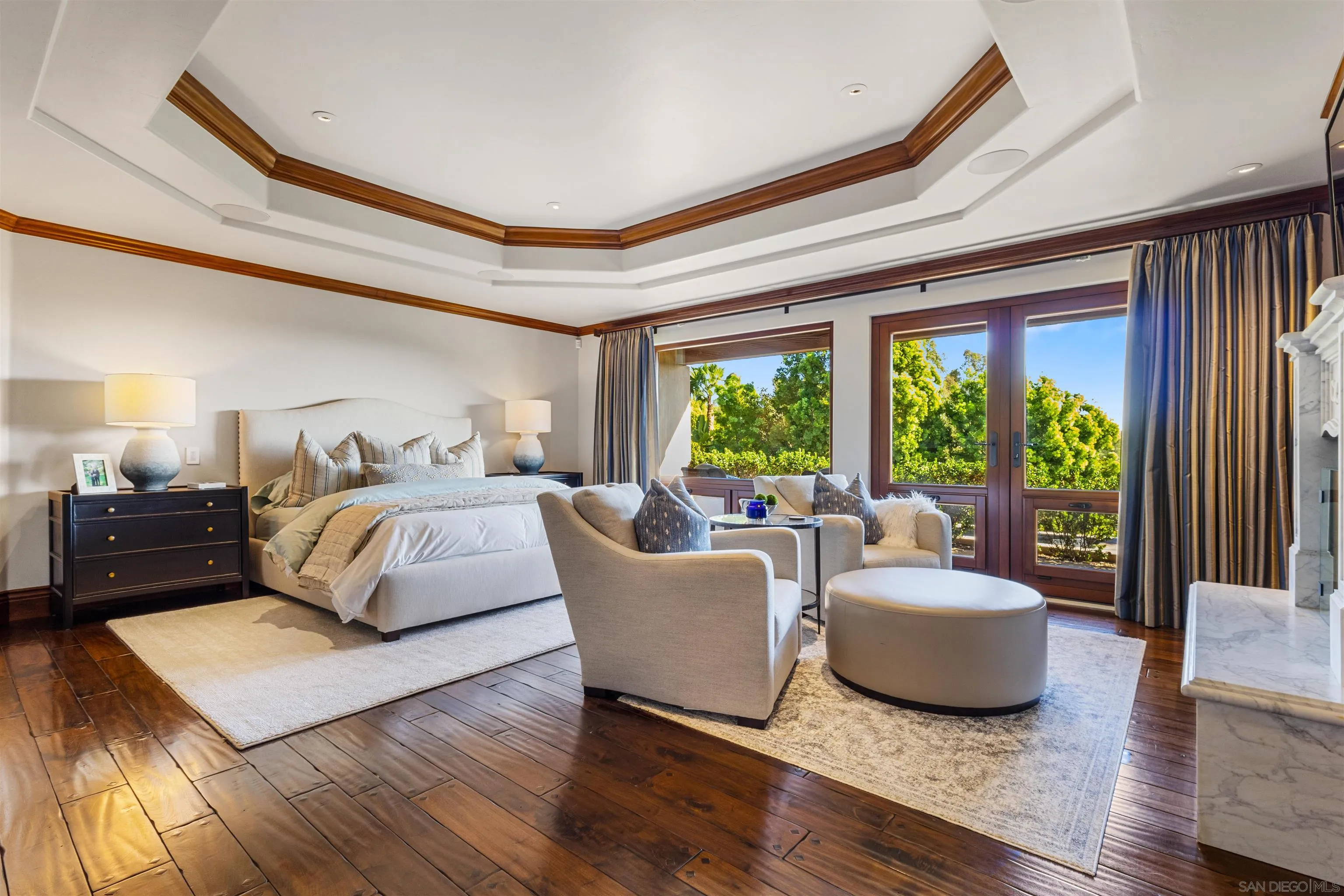 6871 Las Colinas Rancho Santa Fe, CA 92067 - Photo 28 of 60 a bedroom with a bed and large windows