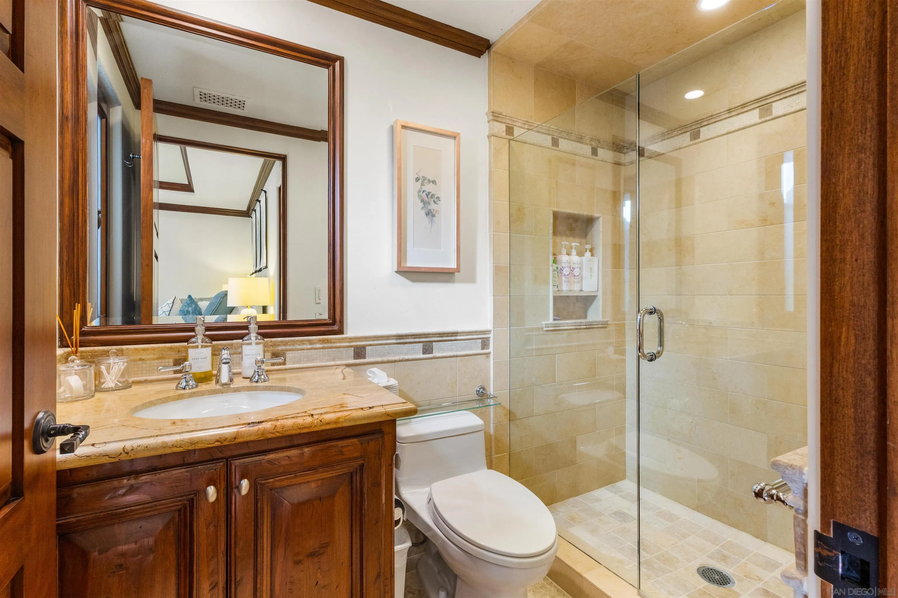 6871 Las Colinas Rancho Santa Fe, CA 92067 - Photo 40 of 60 a bathroom with a granite countertop sink toilet and shower
