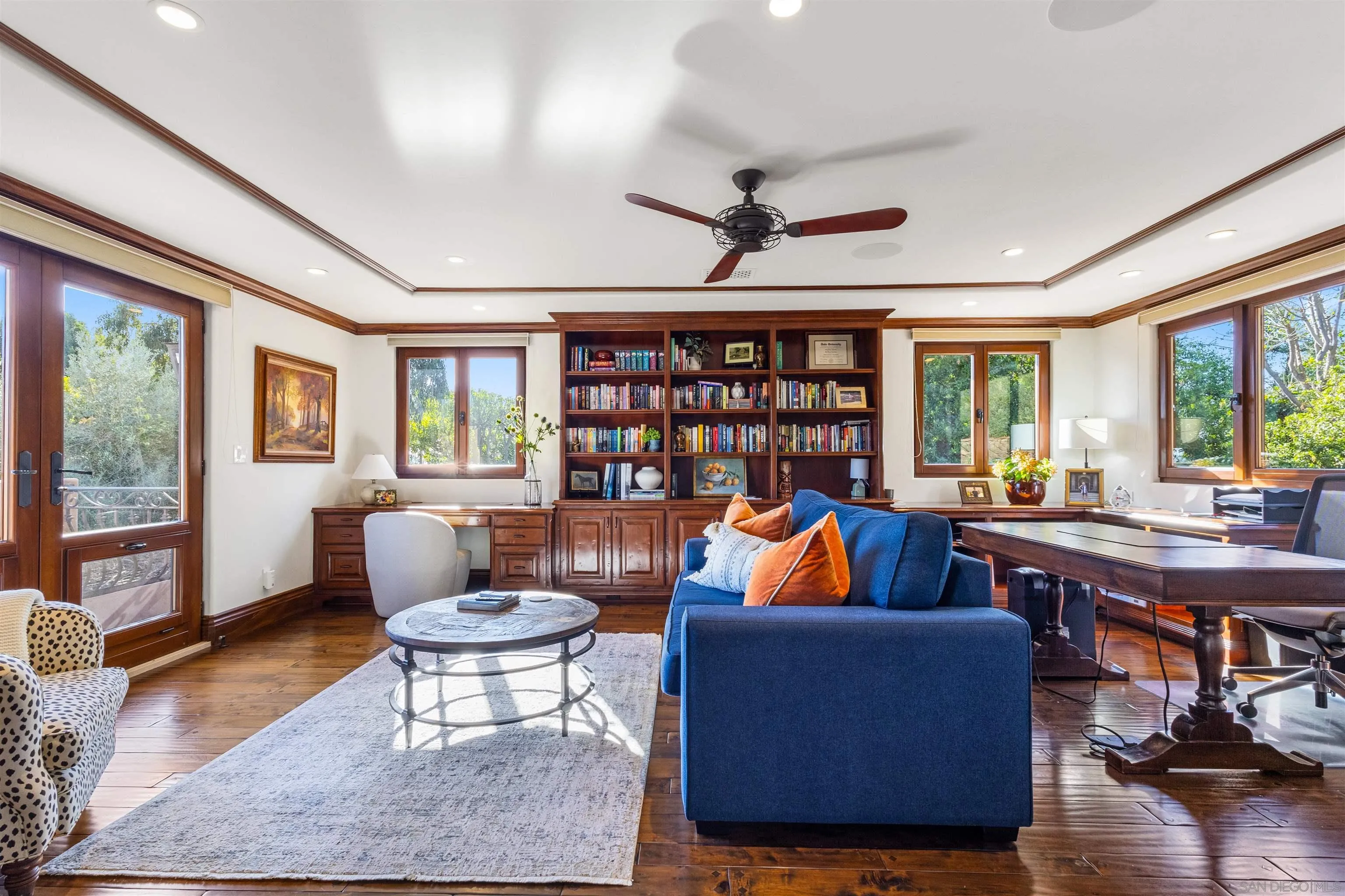 6871 Las Colinas Rancho Santa Fe, CA 92067 - Photo 41 of 60 a living room with furniture a rug and a large window