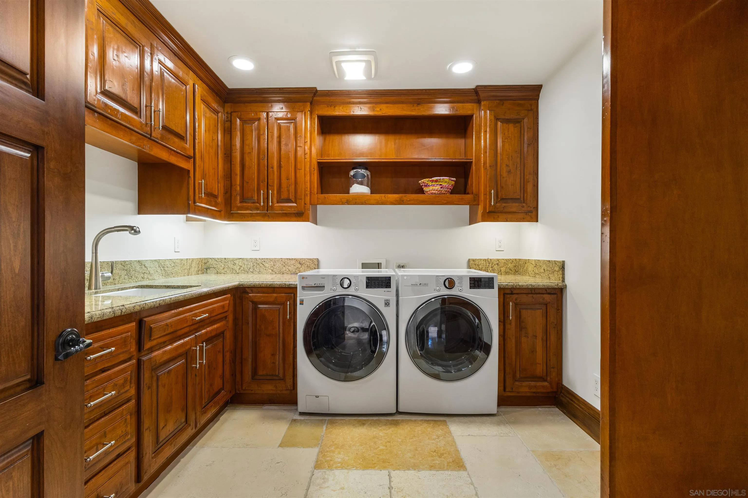 6871 Las Colinas Rancho Santa Fe, CA 92067 - Photo 50 of 60 a utility room with sink dryer and washer