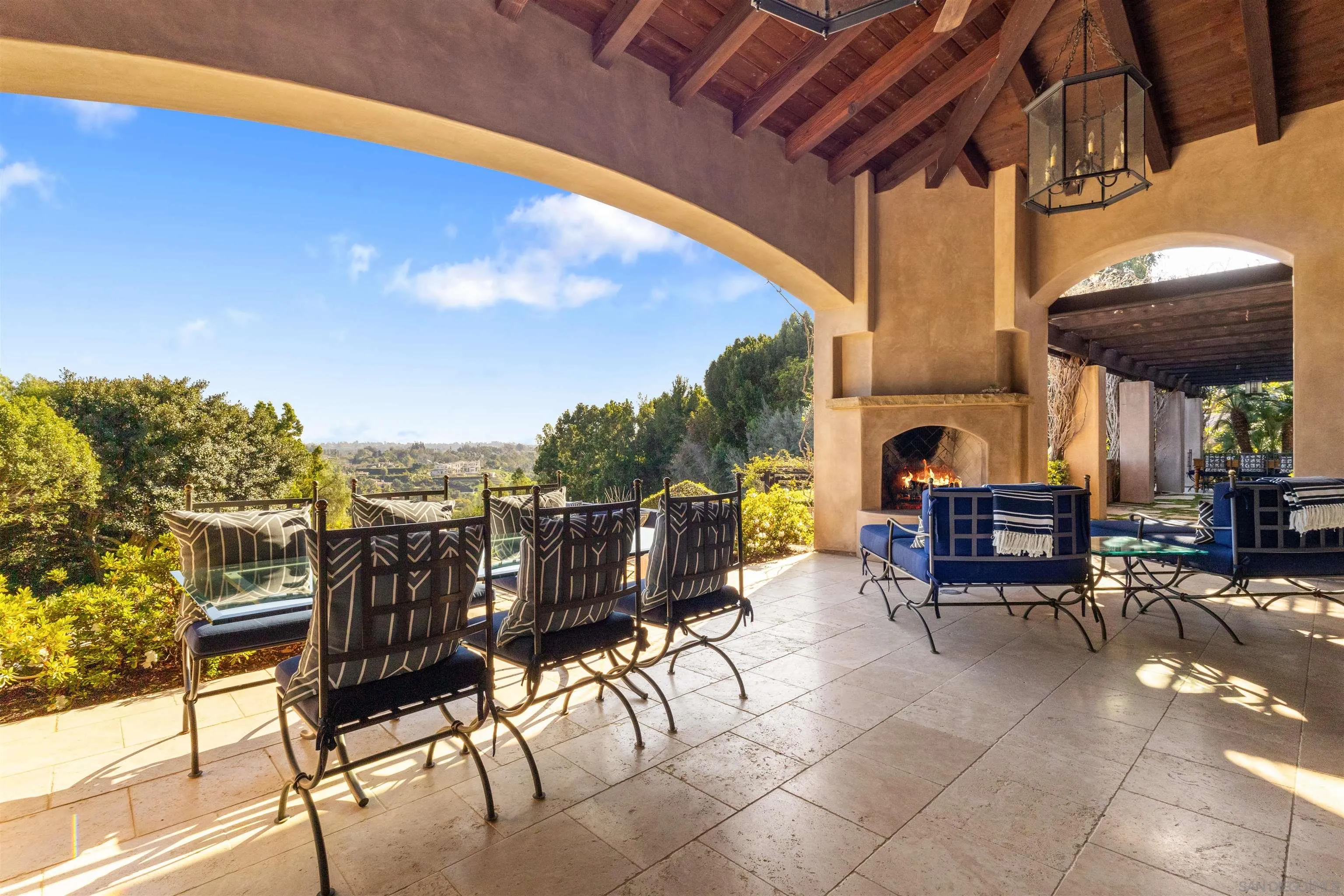 6871 Las Colinas Rancho Santa Fe, CA 92067 - Photo 51 of 60 a view of a patio with a table and chairs