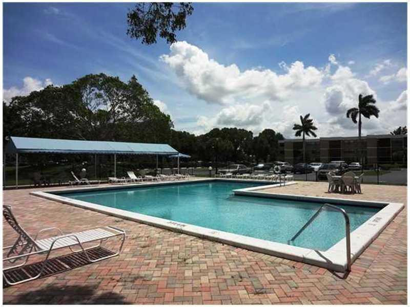 16401 Golf Club Road, Unit 101 Weston, FL 33326 - Photo 13 of 16 Exterior Front