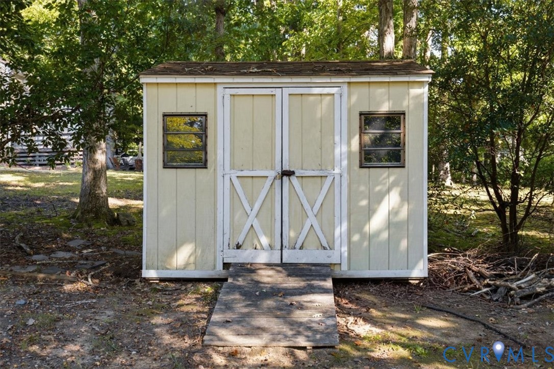 863 Watch Hill Road Midlothian, VA 23114 - Photo 57 of 62 Storage shed with double barn doors, two windows,