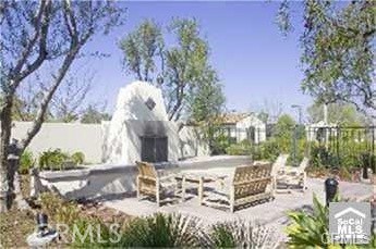 95 Windchime Irvine, CA 92603 - Photo 8 of 8 a view of a backyard with sitting area