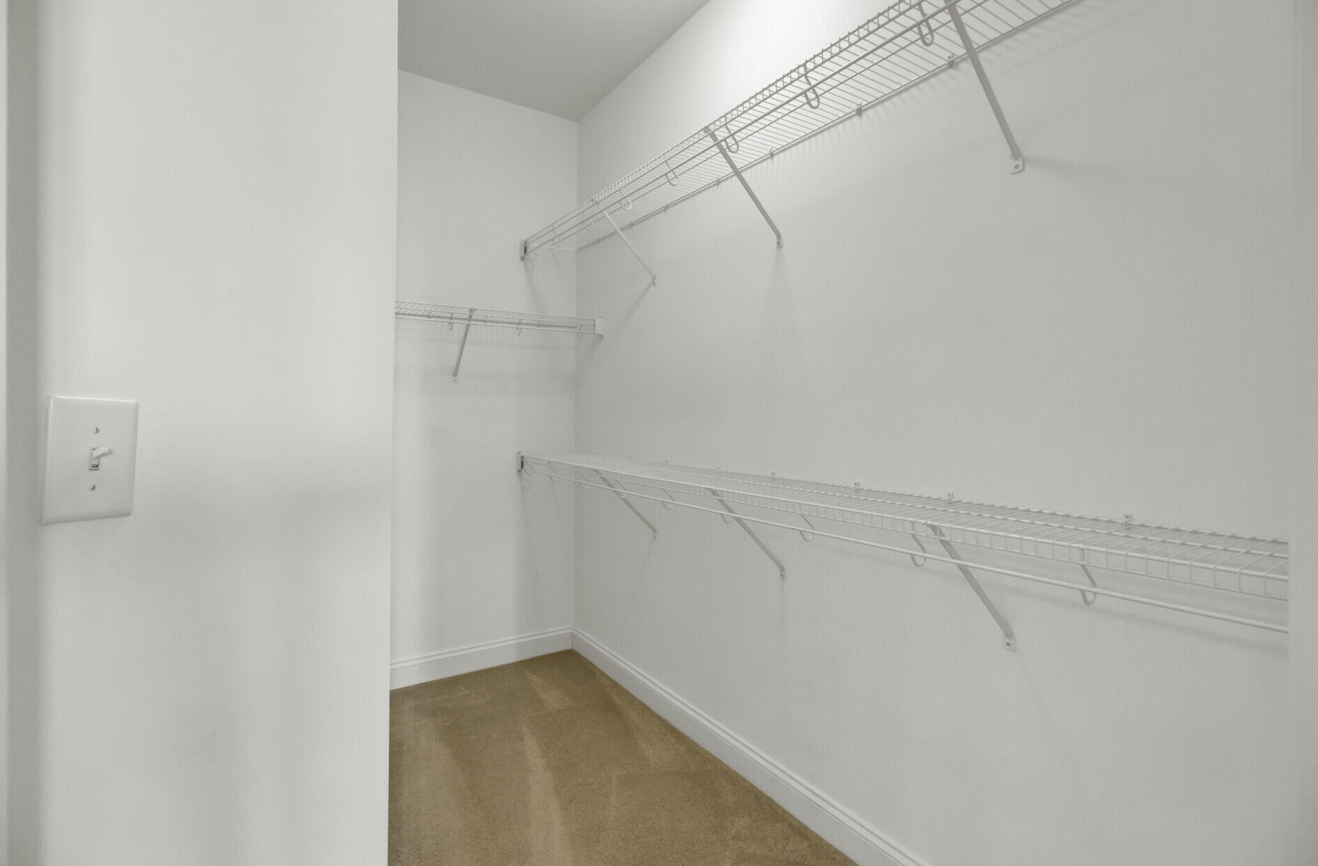 21 George Street, Unit 404 Charleston, SC 29401 - Photo 28 of 49 Primary Walk-In Closet