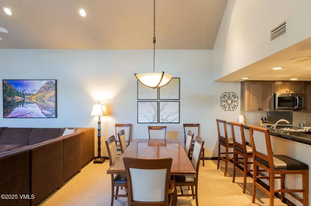 a view of a dining room with furniture