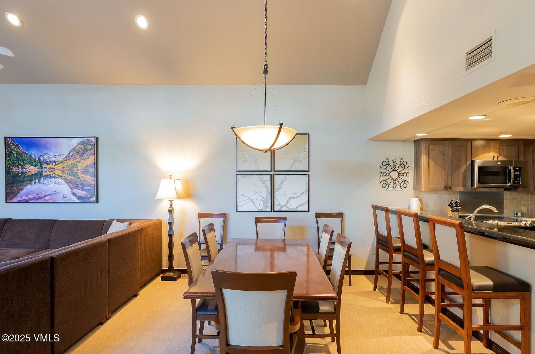 210 Offerson Road, Unit R315 WEEK 14 Beaver Creek, CO 81620 - Photo 7 of 31 a view of a dining room with furniture