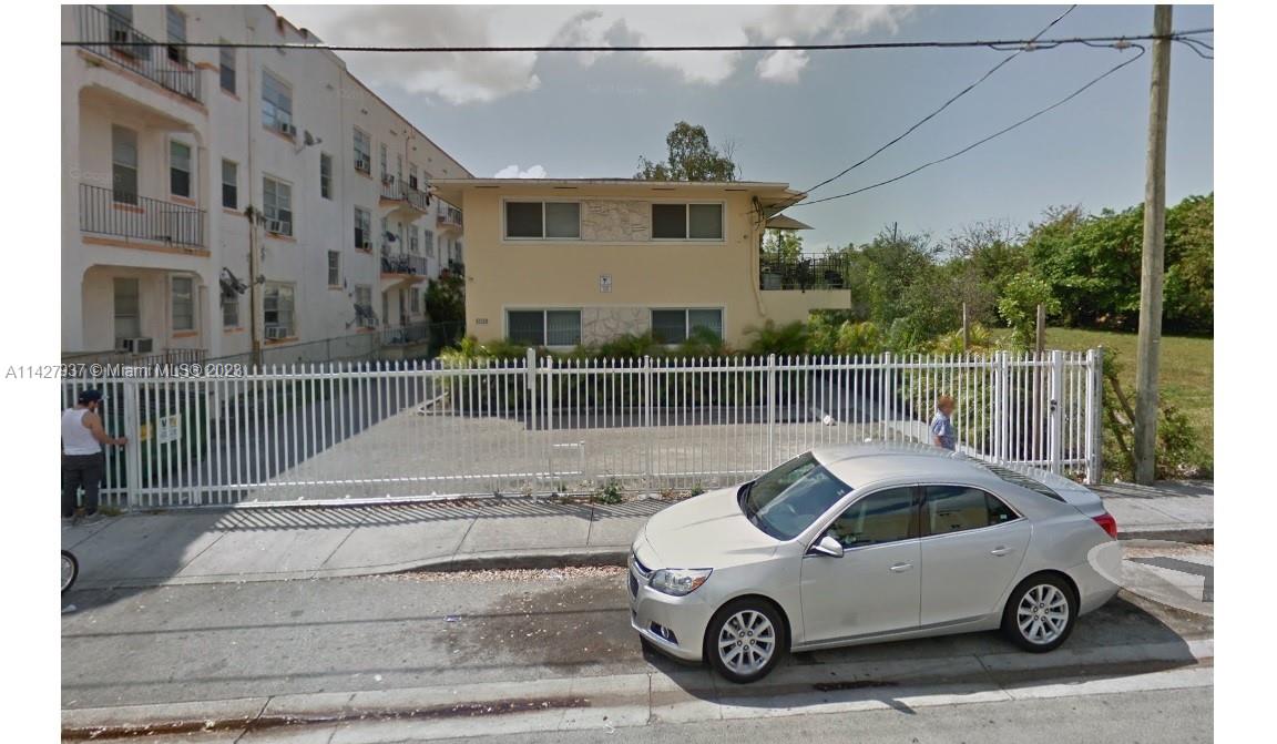 828 Southwest 2nd Street Miami, FL 33130 - Photo 13 of 13 a view of a car parked front of a house