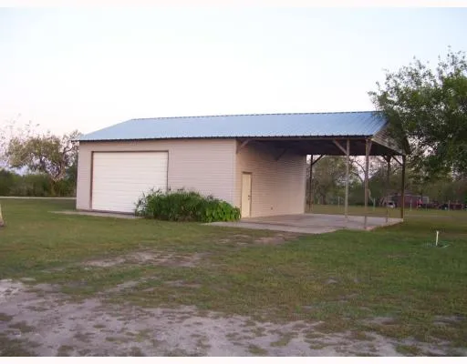 a house view with a outdoor space
