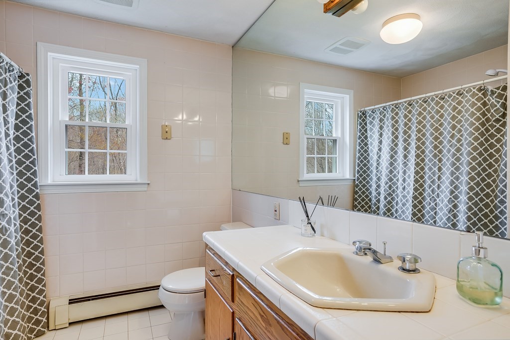 44 Glendale Road Boxford, MA 01921 - Photo 23 of 42 a bathroom with a sink and a toilet