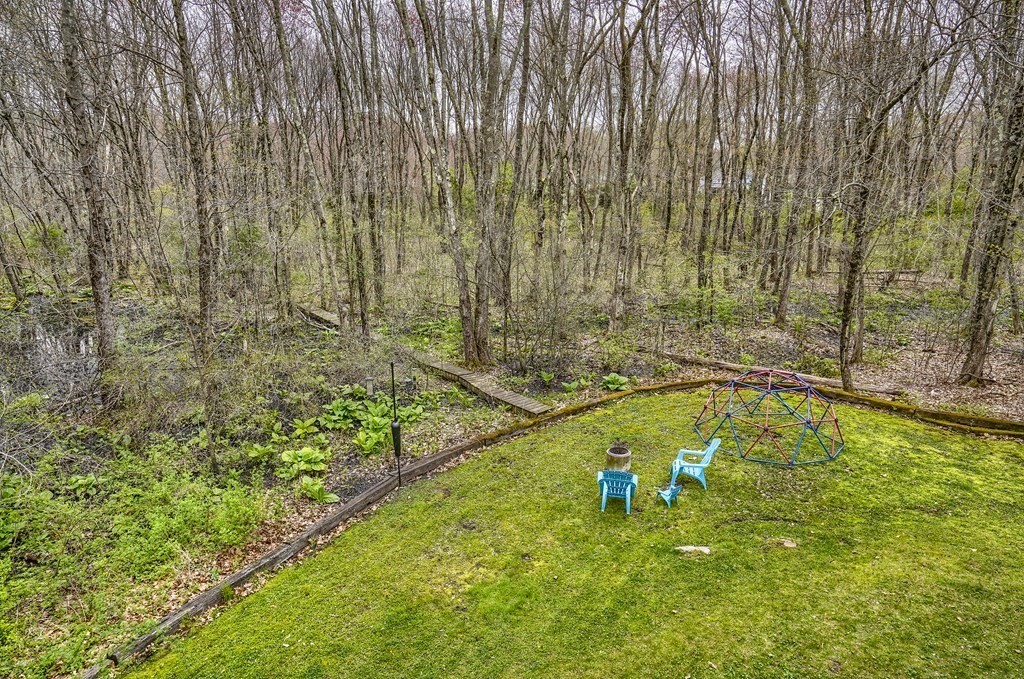 44 Glendale Road Boxford, MA 01921 - Photo 40 of 42 a view of a swimming pool with an outdoor space