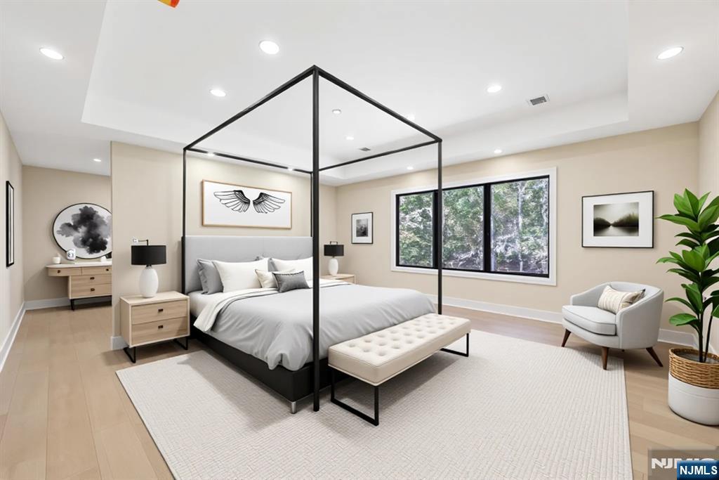 314 Meadowbrook Road Wyckoff, NJ 07481 - Photo 18 of 22 a bedroom with a bed and large window