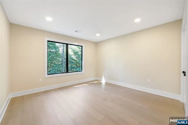 a room with a sink and chandelier