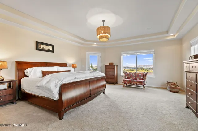 a bedroom with bed and a window