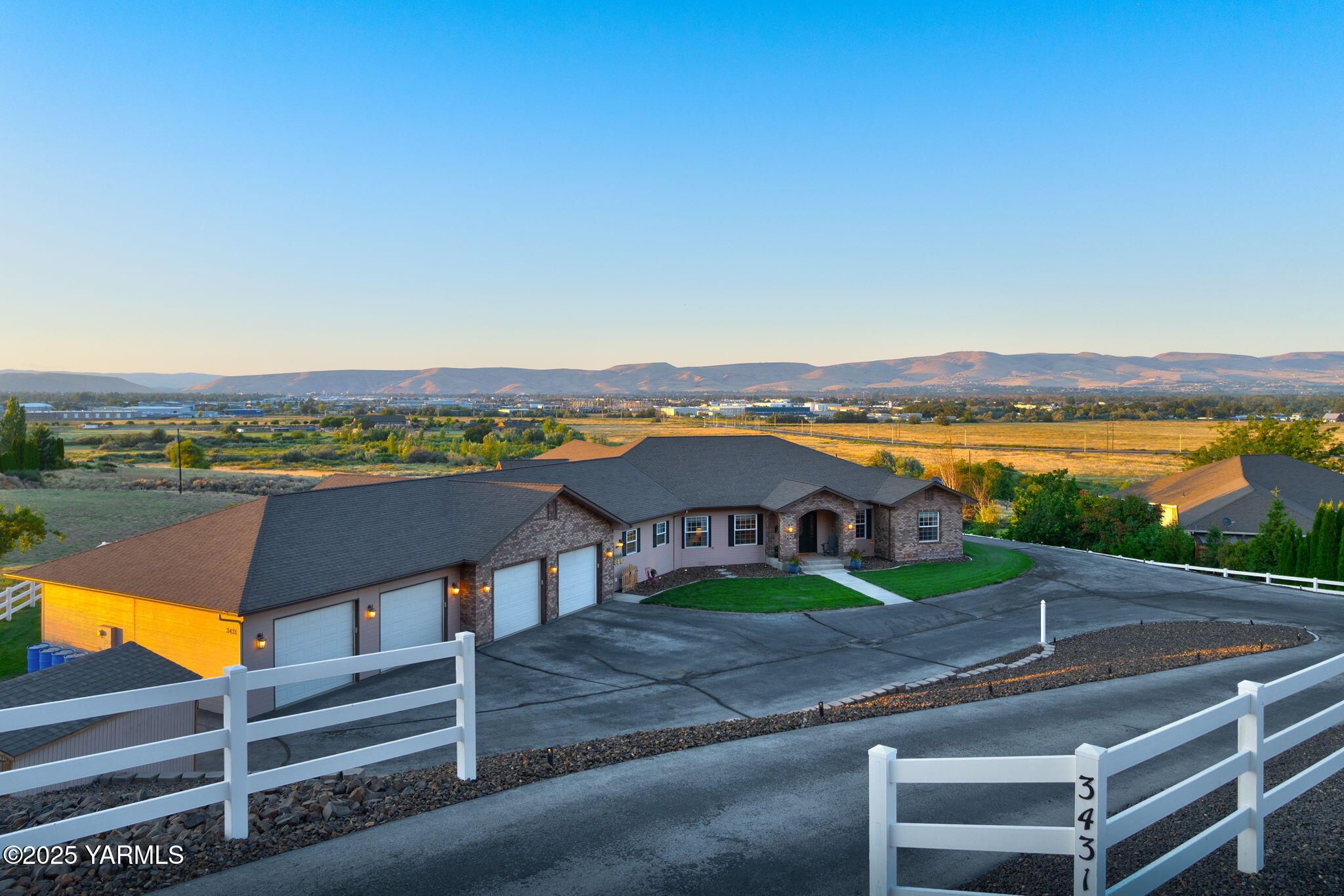 3431 Goodman Road Union Gap, WA 98903 - Photo 2 of 26 a view of a city with an ocean beach