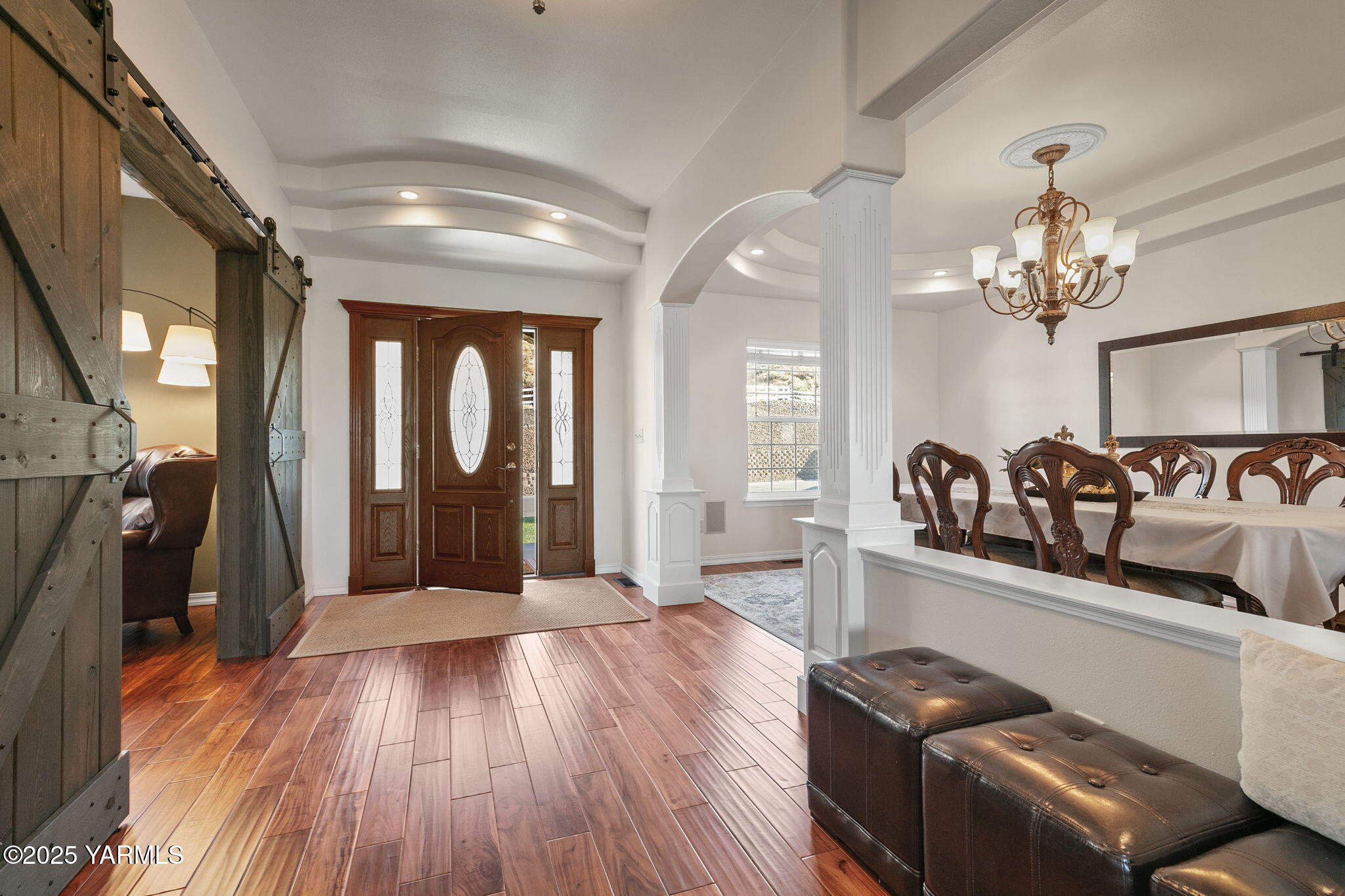 3431 Goodman Road Union Gap, WA 98903 - Photo 7 of 26 a view of a room with wooden floor and furniture