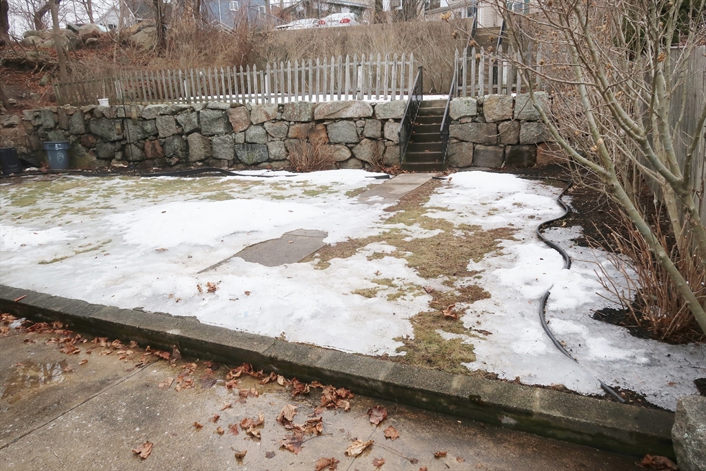 52 Taylor Street Gloucester, MA 01930 - Photo 4 of 12 a view of a snow on the road