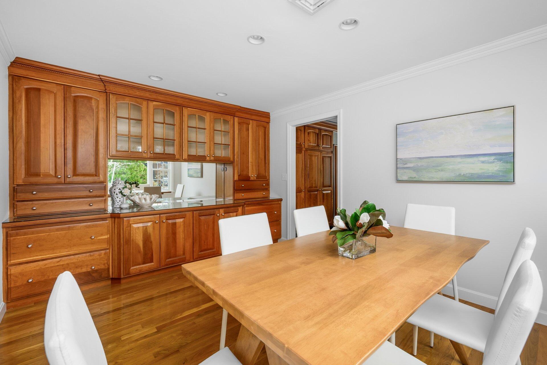 239 Clamshell Cove Road Cotuit, MA 02635 - Photo 11 of 30 a view of a dining room with furniture window and outside view