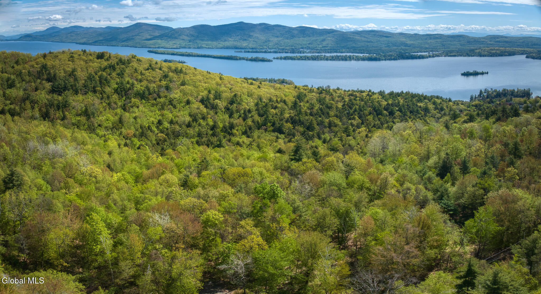 L63.011 Shaw Road, Unit A2 Lake George, NY 12845 - Photo 6 of 17 DJI_20240513103924_0108_D-Pano
