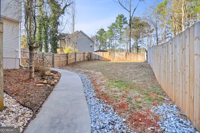 a view of a yard with a fountain