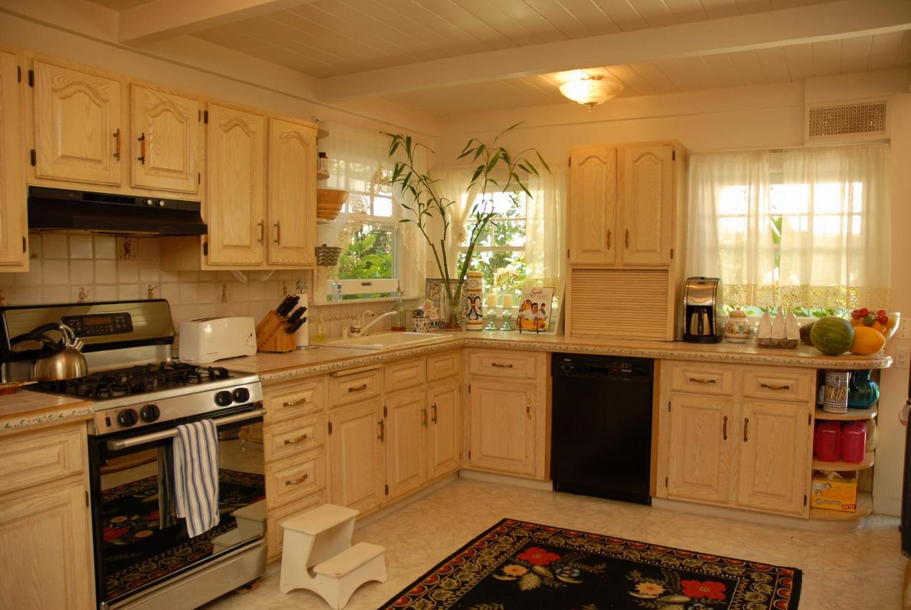 71 Eucalyptus Lane Santa Barbara, CA 93108 - Photo 5 of 10 a kitchen with stainless steel appliances a stove a sink and a microwave