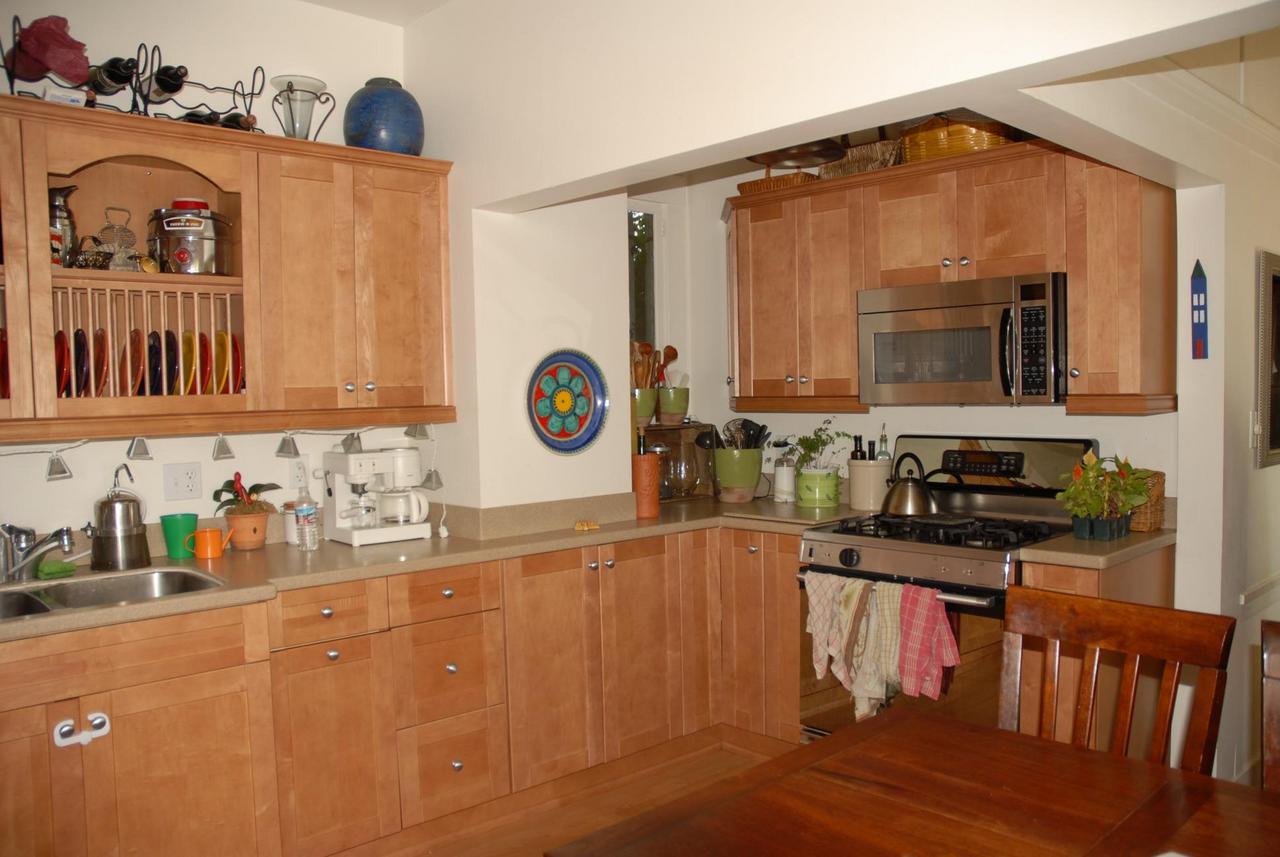 71 Eucalyptus Lane Santa Barbara, CA 93108 - Photo 8 of 10 a kitchen with stainless steel appliances a stove a sink and a cabinets