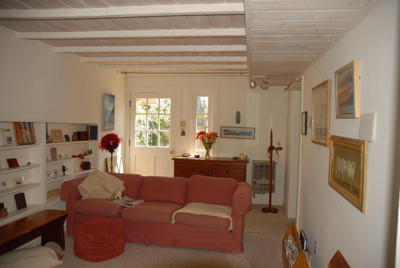 71 Eucalyptus Lane Santa Barbara, CA 93108 - Photo 9 of 10 a living room with furniture and a chandelier