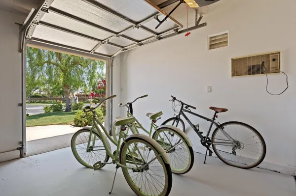a view of an bike next to a yard