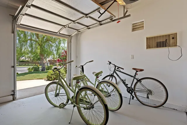 a view of an bike next to a yard