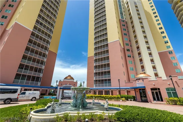 a view of a city with tall buildings