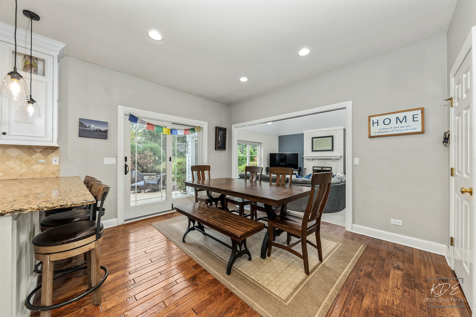 731 Gateshead Drive Naperville, IL 60565 - Photo 15 of 51 a view of a dining room with furniture window and wooden floor