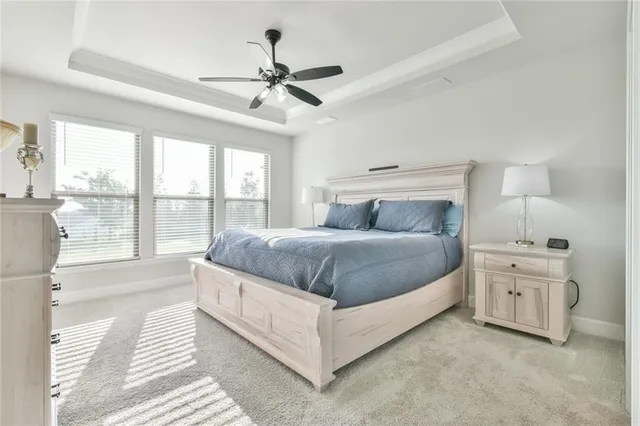 a view of a livingroom with furniture and chandelier