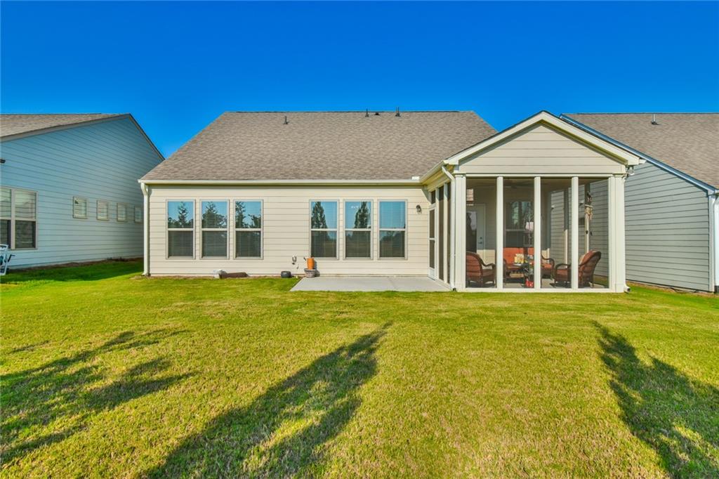 5051 Adler Court Hoschton, GA 30548 - Photo 28 of 41 a view of a house with a swimming pool