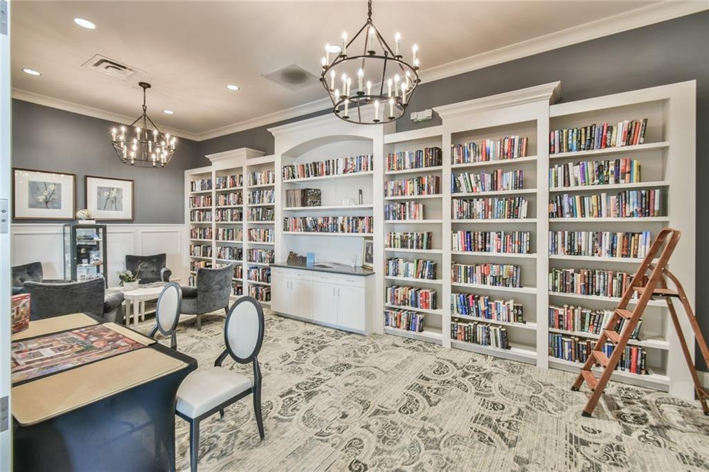 5051 Adler Court Hoschton, GA 30548 - Photo 32 of 41 a view of a livingroom with furniture and chandelier