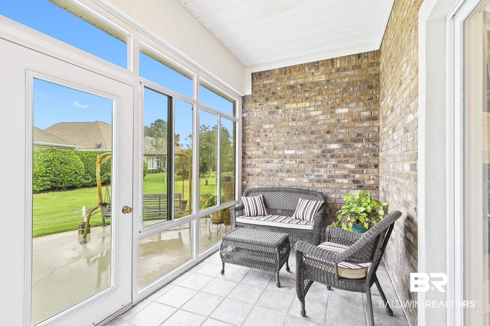 22512 Inverness Way Foley, AL 36535 - Photo 35 of 43 View of sunroom