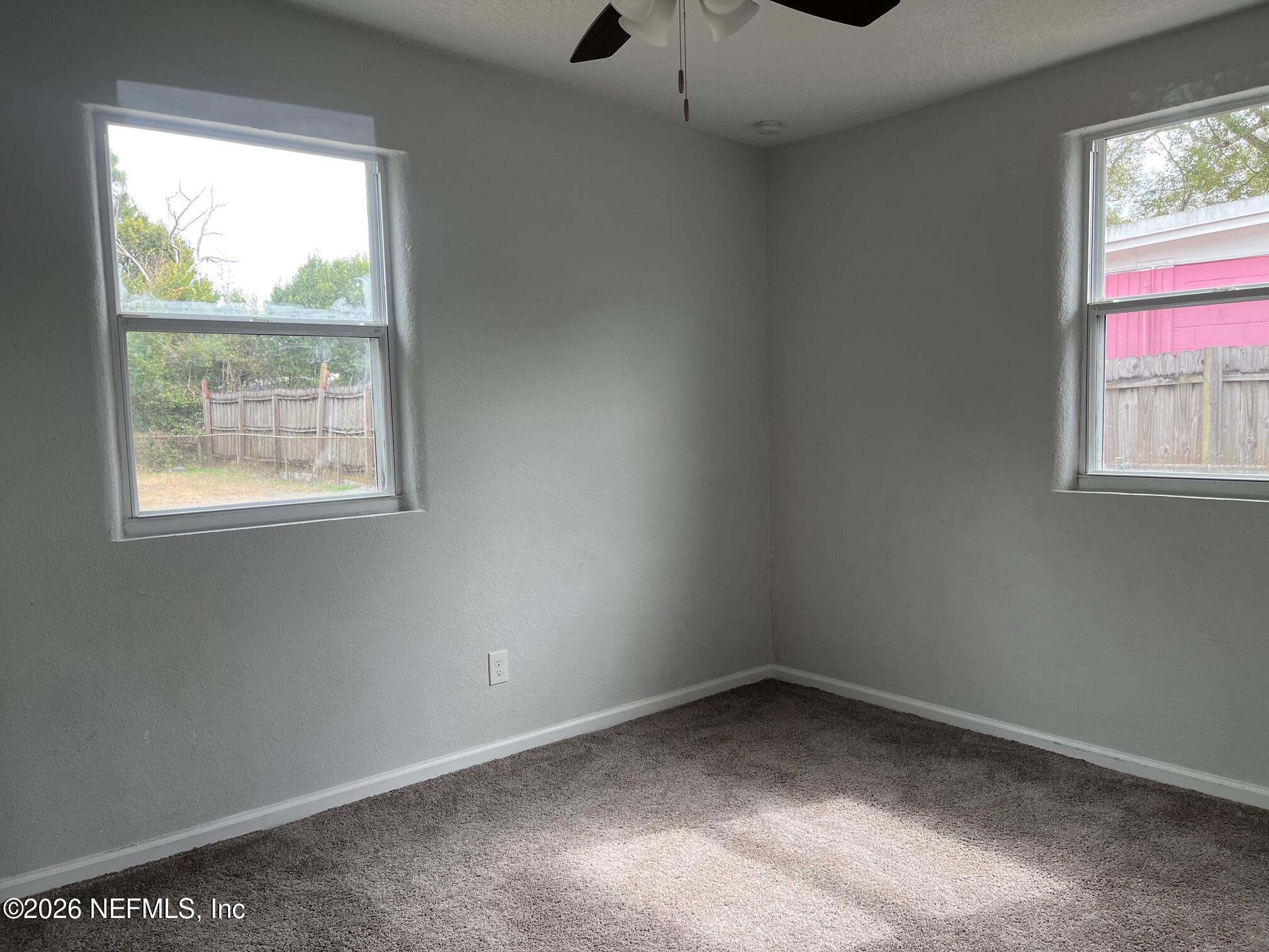 10547 Briarcliff Road East Jacksonville, FL 32218 - Photo 16 of 33 an empty room with a window