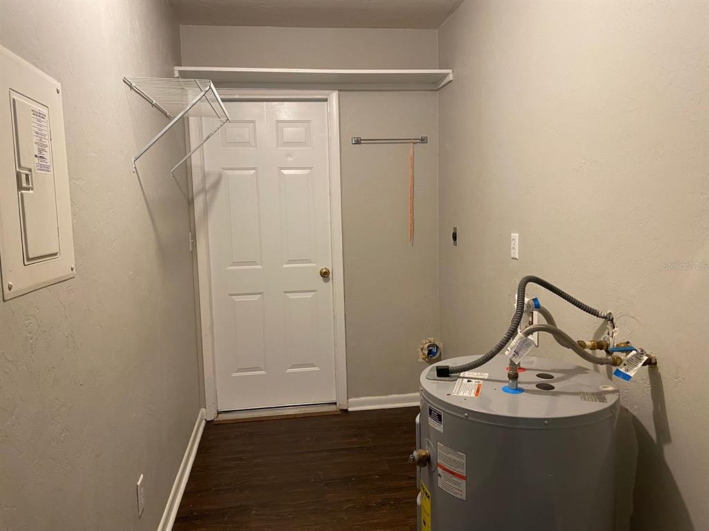 2858 Southwest 39th Avenue Gainesville, FL 32608 - Photo 9 of 12 a bathroom with a sink and mirror