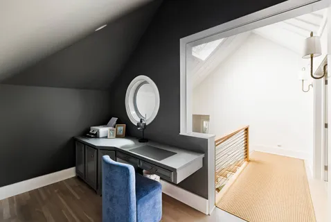 a bathroom with a shower a sink and a mirror