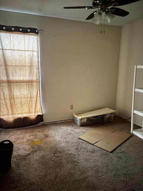 1107 Rimcrest Drive Arlington, TX 76017 - Photo 11 of 13 a view of an empty room with a window