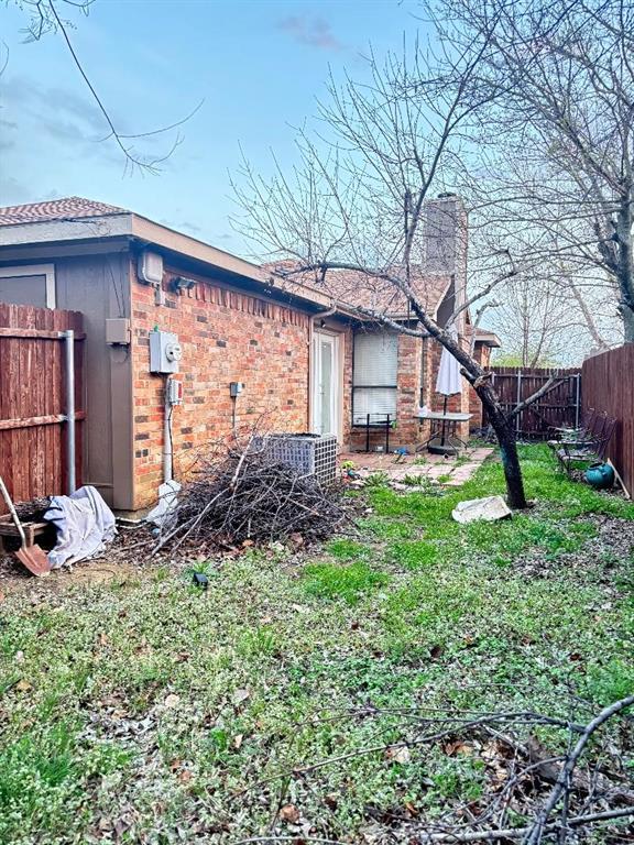1107 Rimcrest Drive Arlington, TX 76017 - Photo 13 of 13 a backyard of a house with seating space