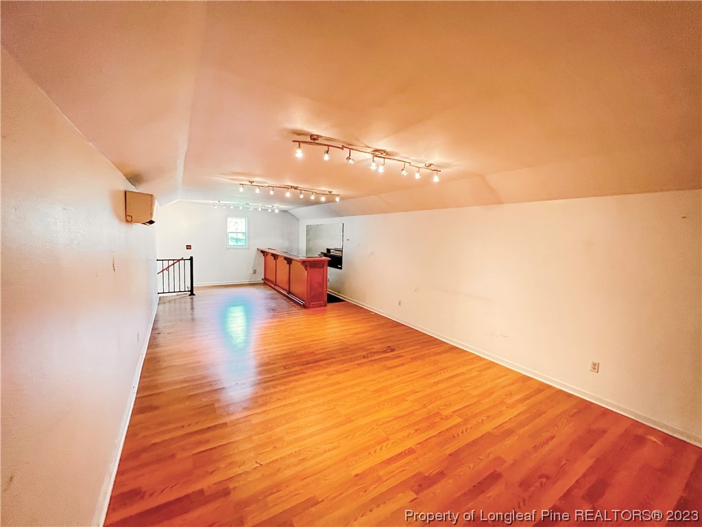 74 Decker Road St. Pauls, NC 28384 - Photo 12 of 46 a view of empty room with wooden floor