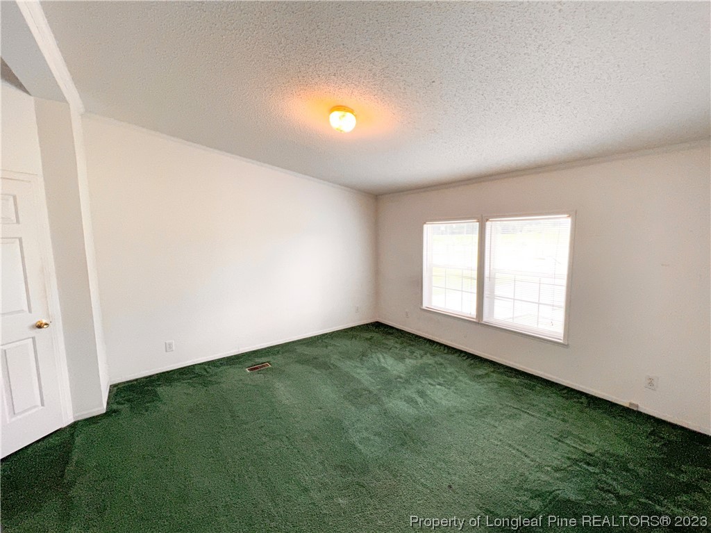 74 Decker Road St. Pauls, NC 28384 - Photo 34 of 46 a view of an empty room with window